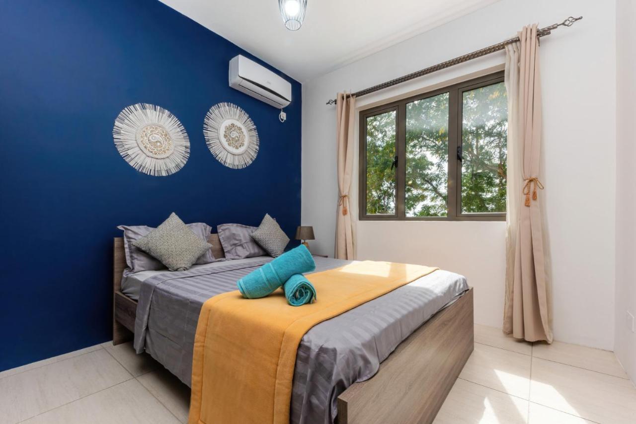 Apartment West Wood Apartment: Poolside Retreat Near Flic en Flac