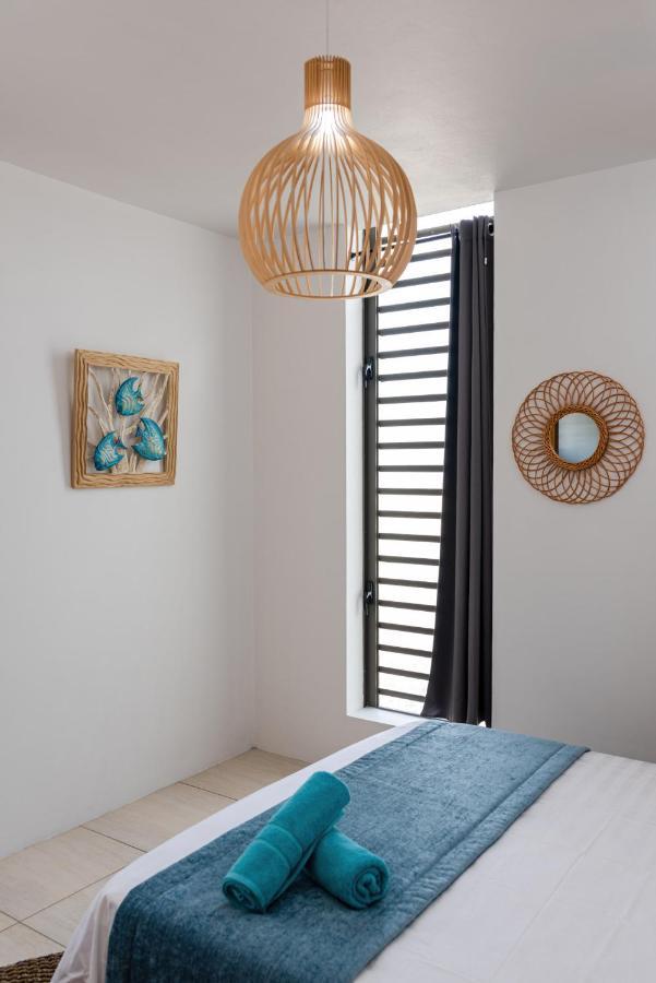 Apartment West Wood Apartment: Poolside Retreat Near Flic en Flac